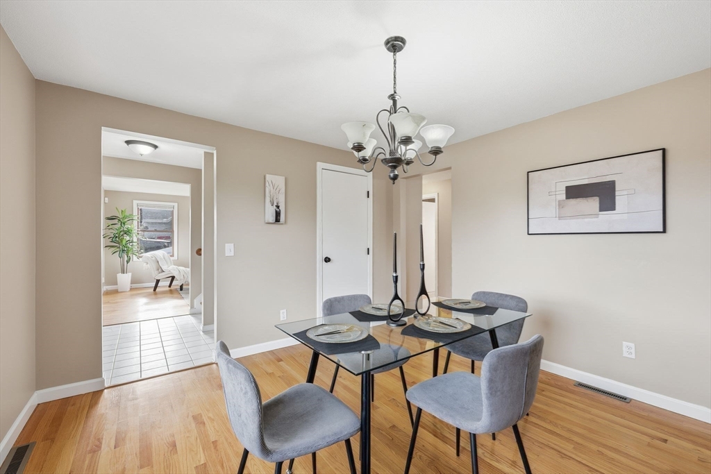 10 Woodcrest Road Springfield, MA 01129 - Photo 15 of 26 a view of a dining room with furniture and wooden floor