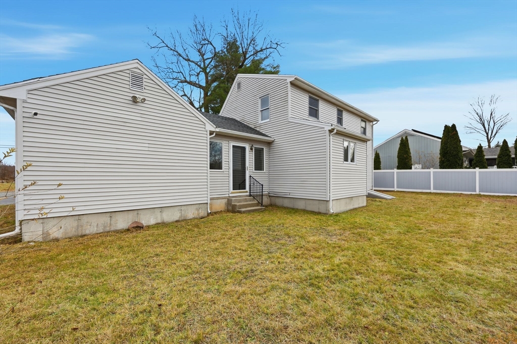 10 Woodcrest Road Springfield, MA 01129 - Photo 25 of 26 a house that has a tree in front of it