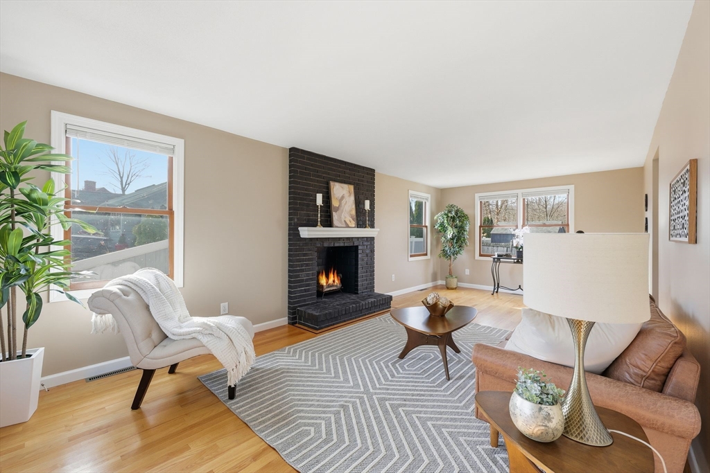 10 Woodcrest Road Springfield, MA 01129 - Photo 3 of 26 a living room with furniture and a fireplace