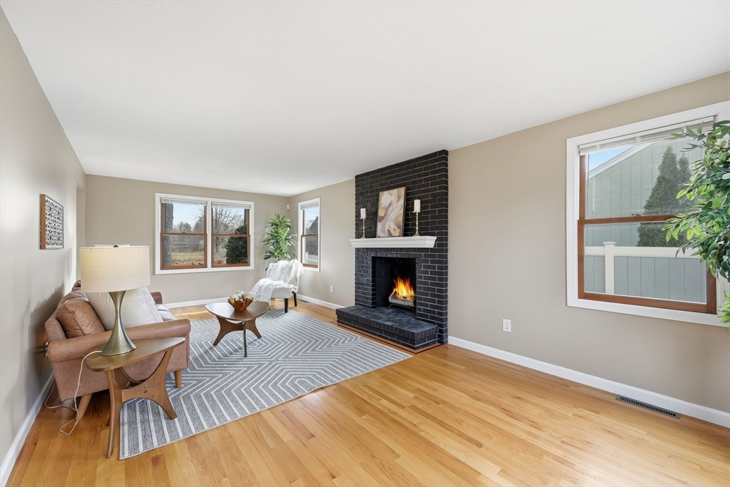 10 Woodcrest Road Springfield, MA 01129 - Photo 4 of 26 a living room with furniture and a fireplace