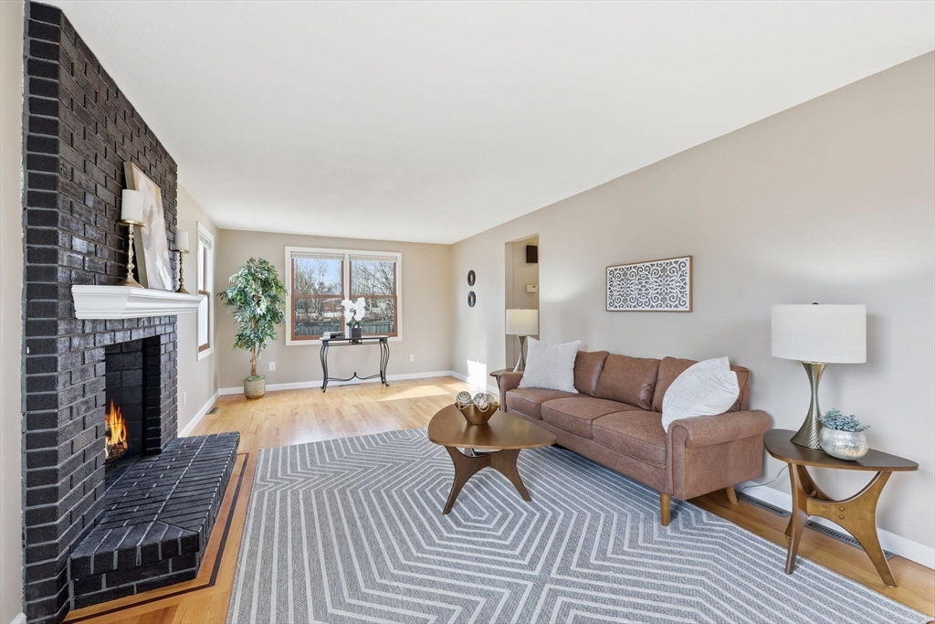 10 Woodcrest Road Springfield, MA 01129 - Photo 5 of 26 a living room with furniture and a fireplace