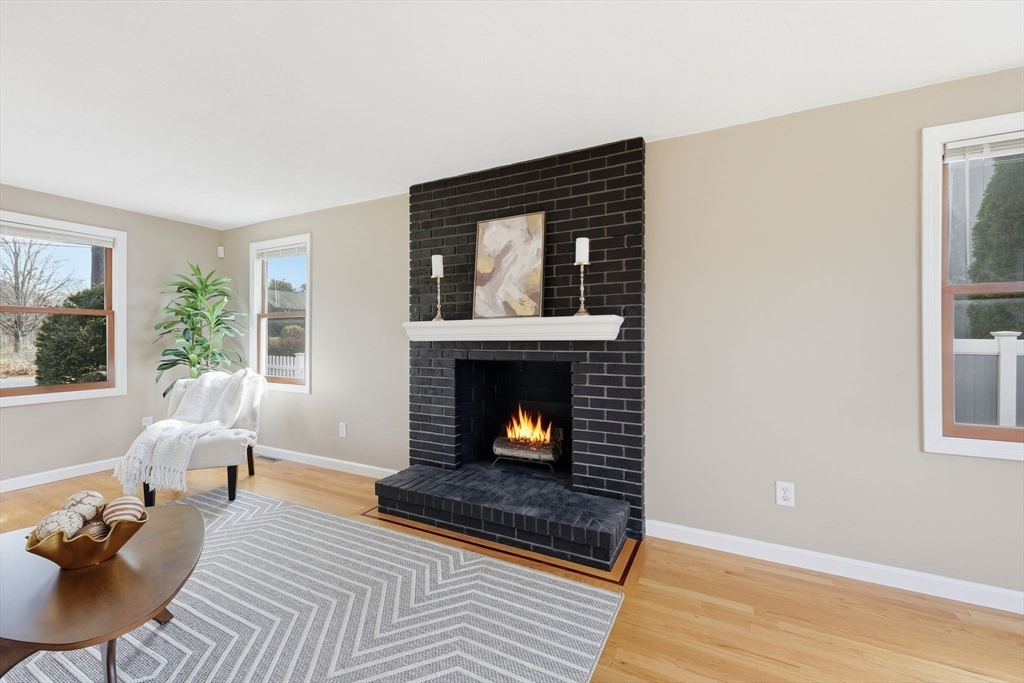 10 Woodcrest Road Springfield, MA 01129 - Photo 6 of 26 a living room with furniture and a fireplace