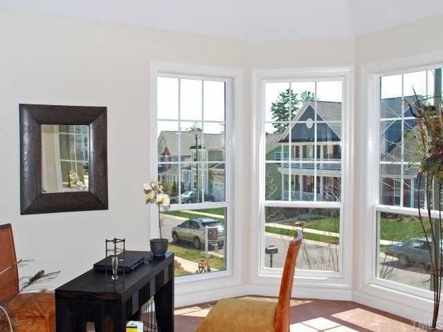 Formal Living Room w/ GIANT Bay Window - Currently used as an office, but a baby grande piano would fit this room very nicely. Living Room