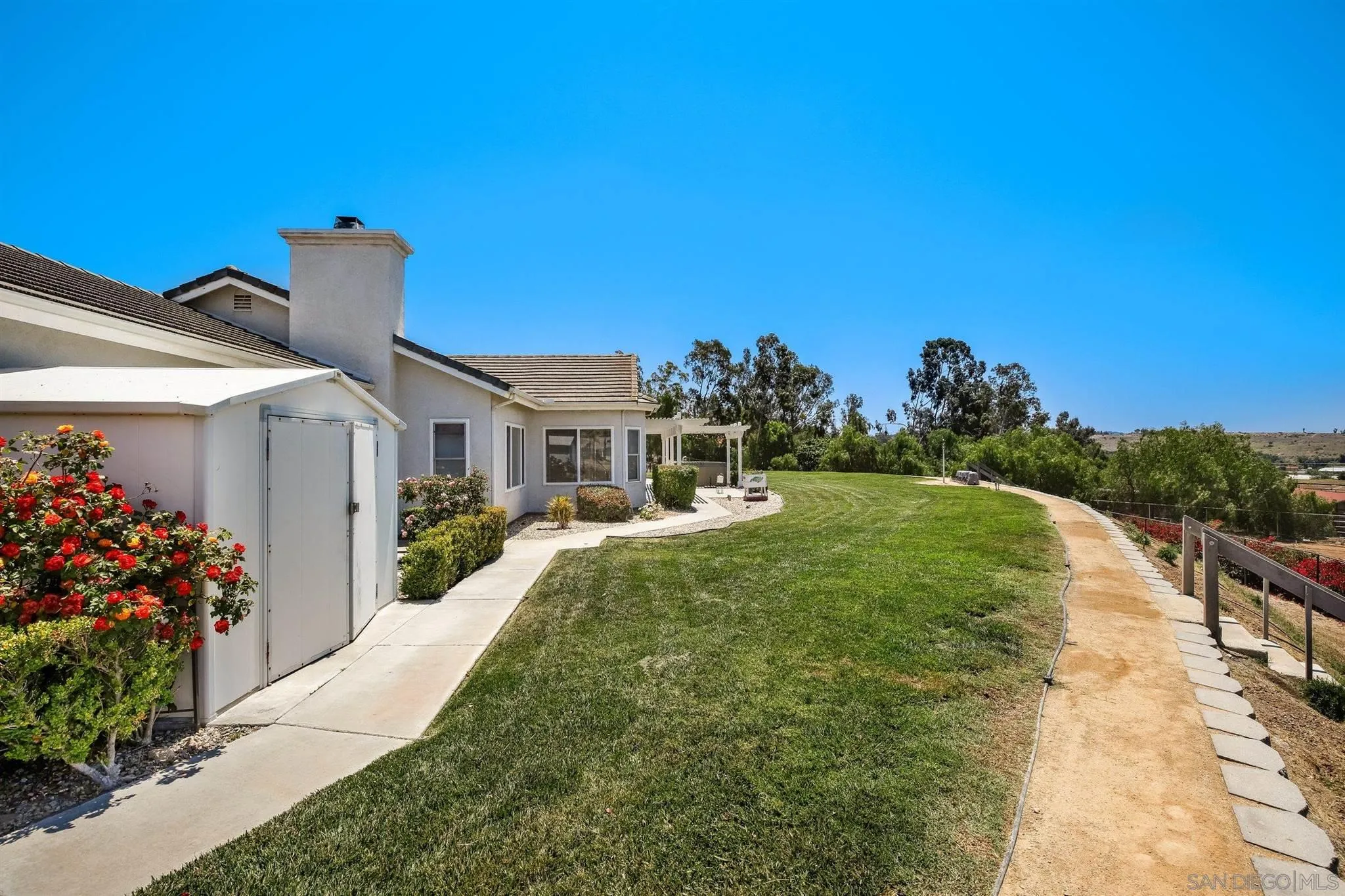 31210 Rivoli Road Valley Center, CA 92082 - Photo 31 of 62 a front view of a house with a yard