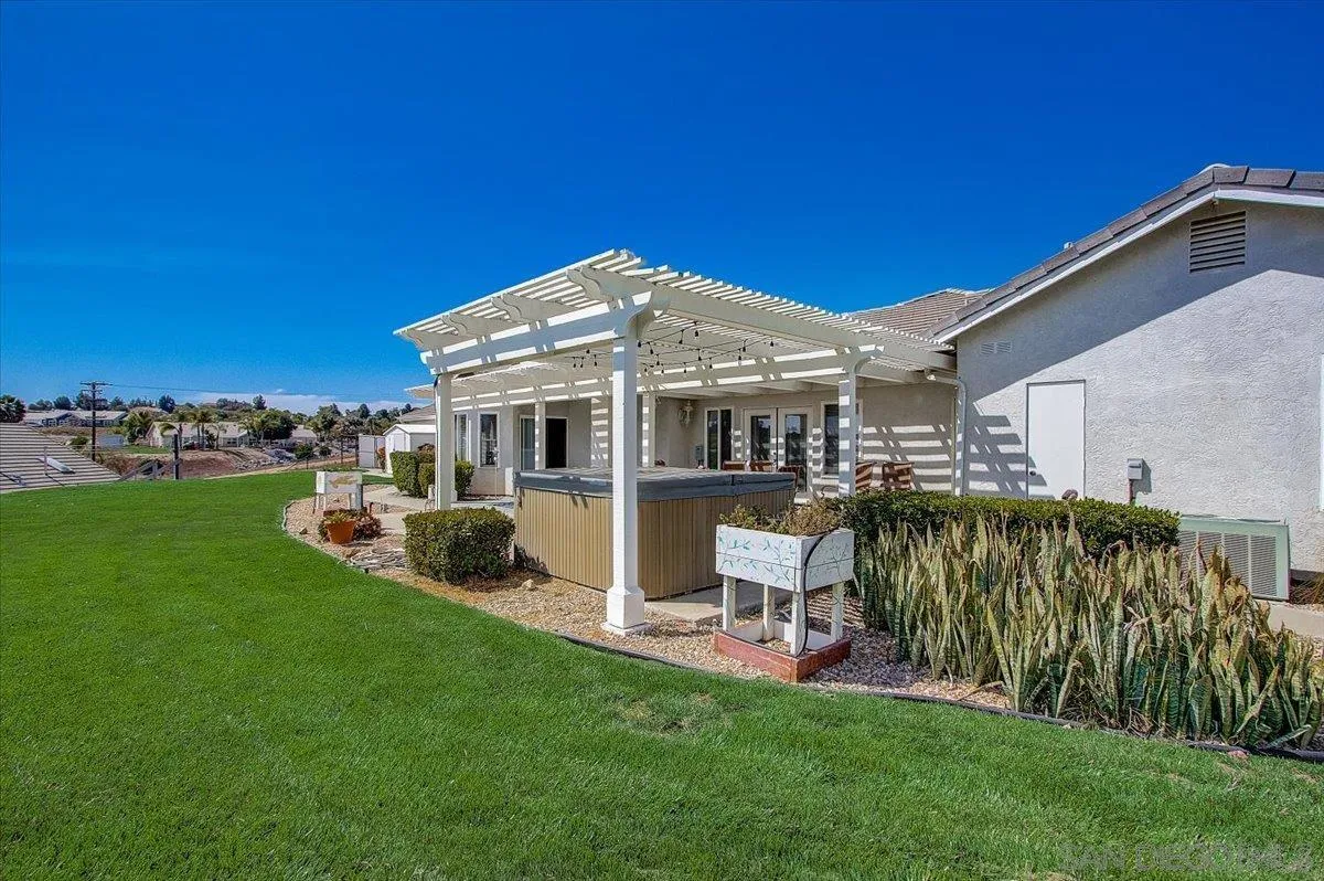 31210 Rivoli Road Valley Center, CA 92082 - Photo 32 of 62 a view of a house with a yard patio and sitting area