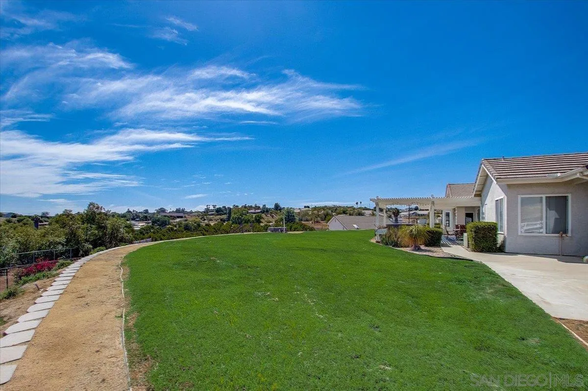 31210 Rivoli Road Valley Center, CA 92082 - Photo 34 of 62 a view of a patio with a yard