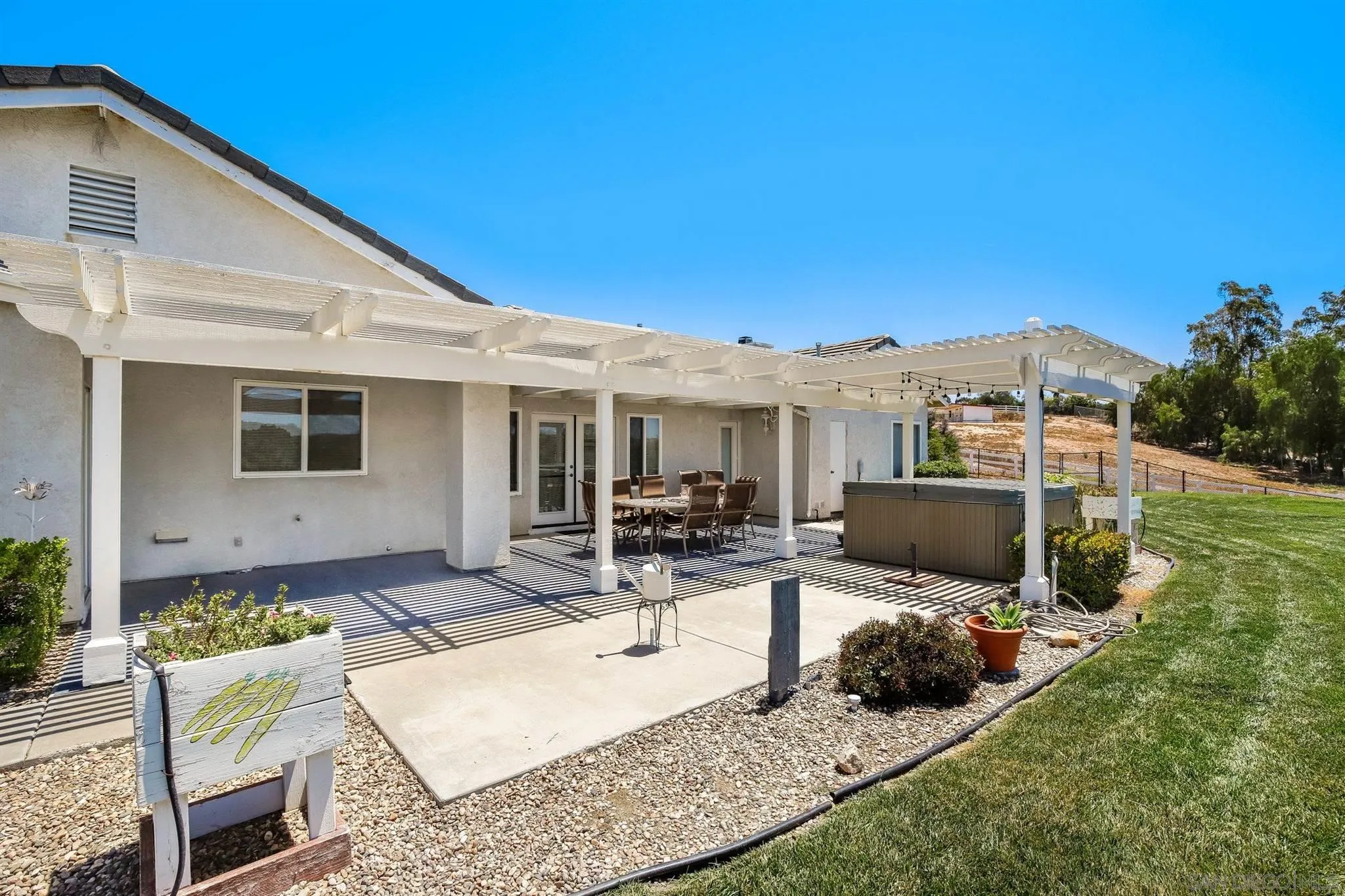 31210 Rivoli Road Valley Center, CA 92082 - Photo 37 of 62 front view of a house with a patio