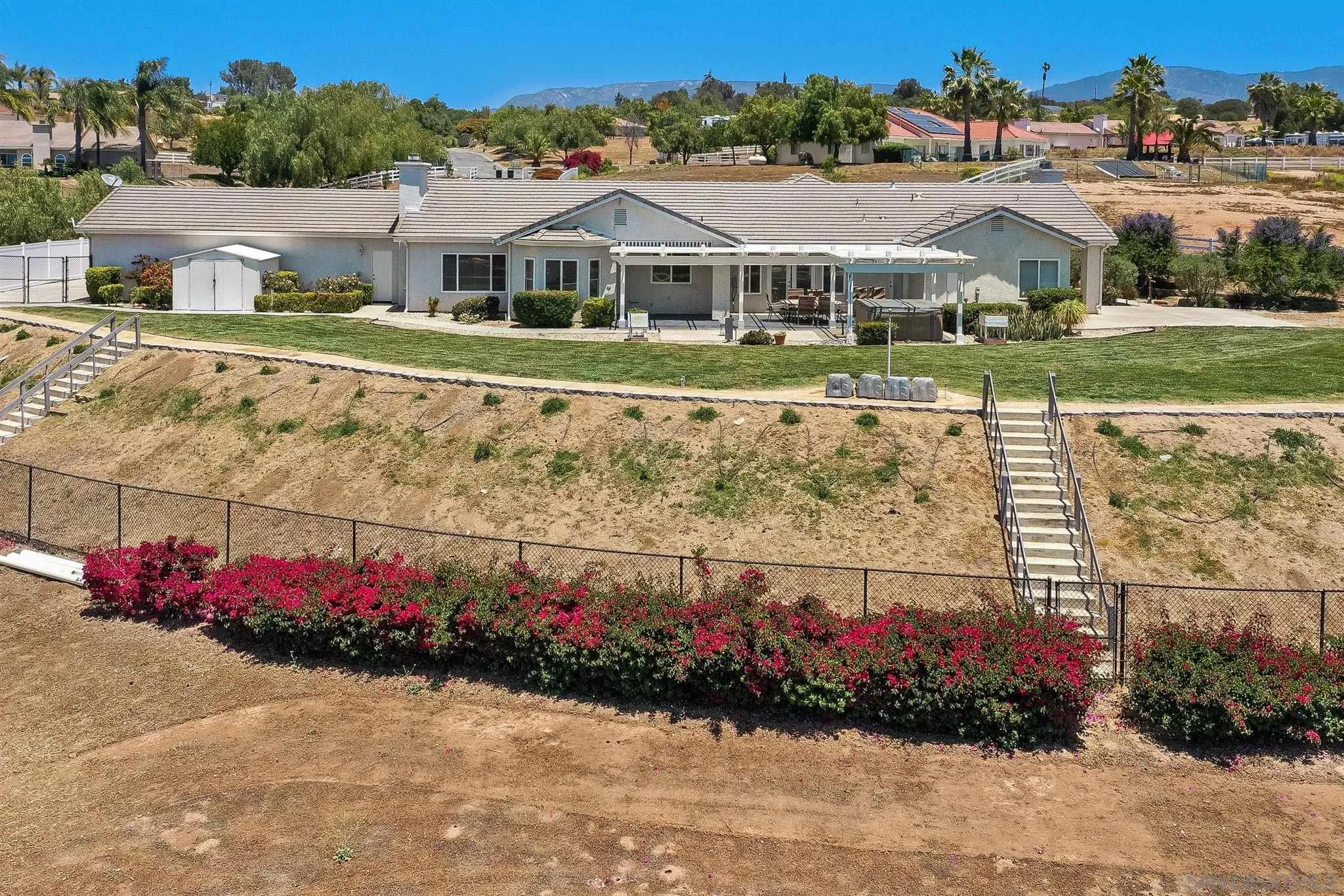 31210 Rivoli Road Valley Center, CA 92082 - Photo 38 of 62 front view of a house with a yard