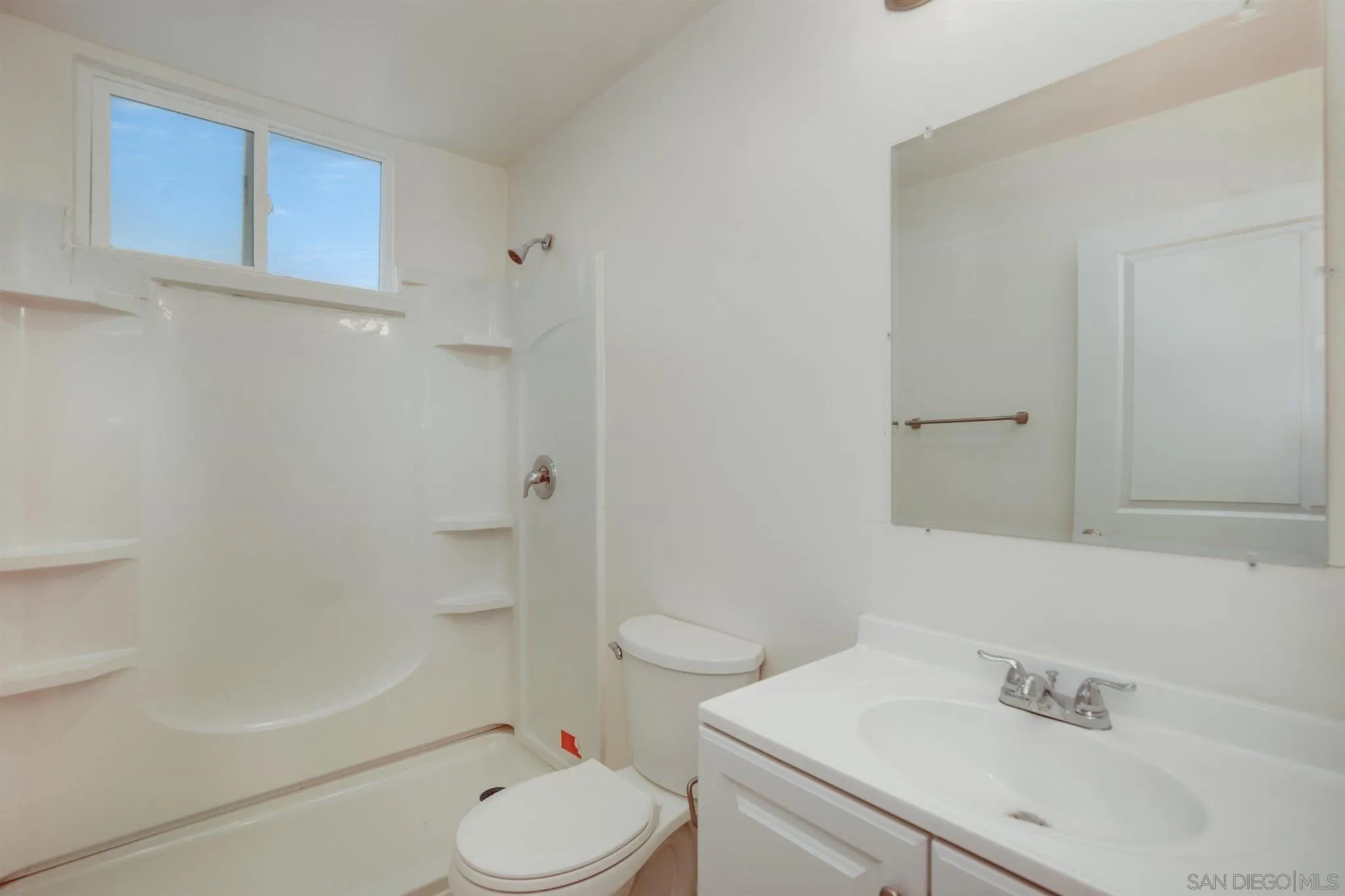 31210 Rivoli Road Valley Center, CA 92082 - Photo 52 of 62 a bathroom with a sink toilet and shower