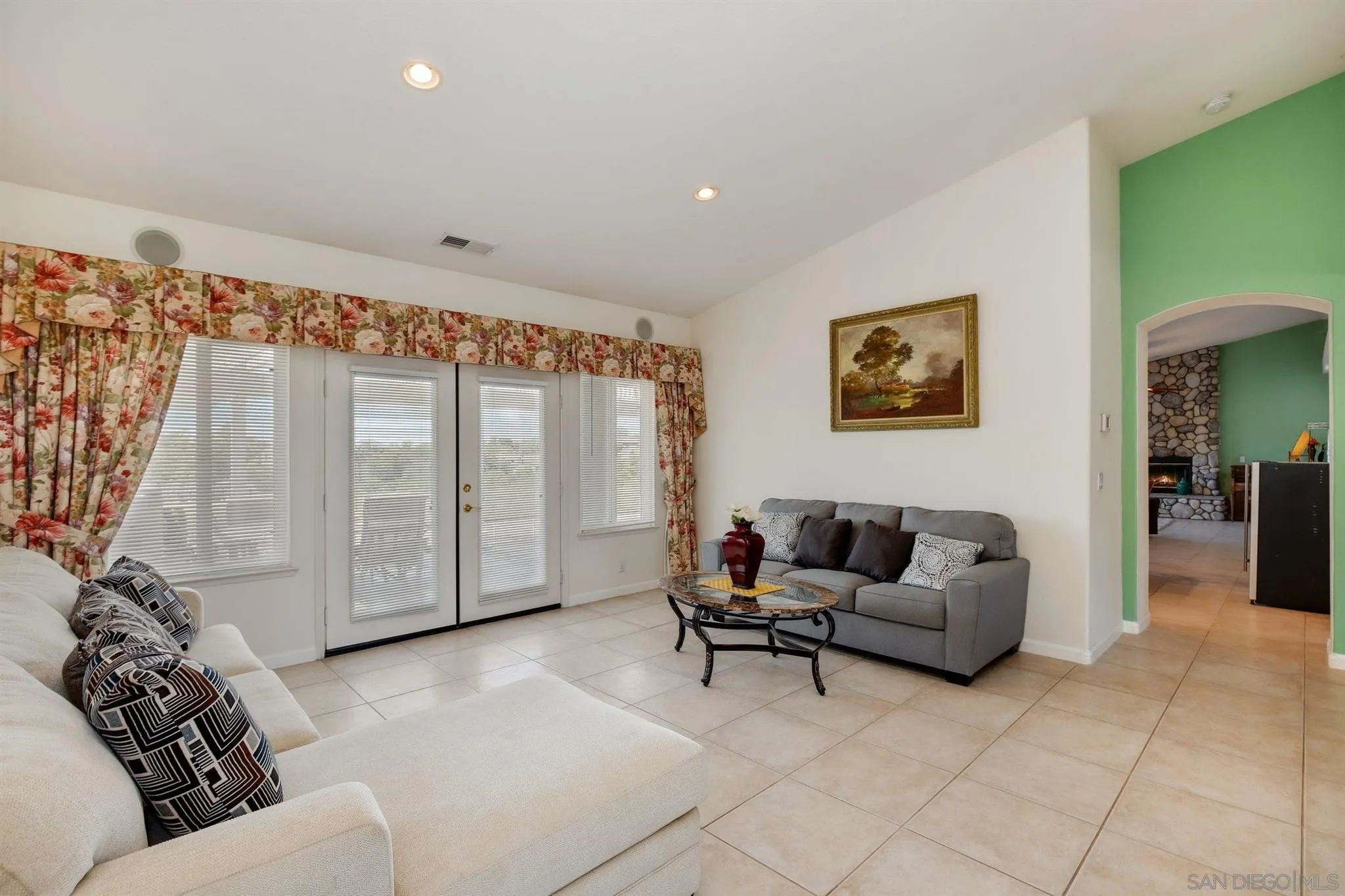 31210 Rivoli Road Valley Center, CA 92082 - Photo 7 of 62 a living room with furniture and a large window