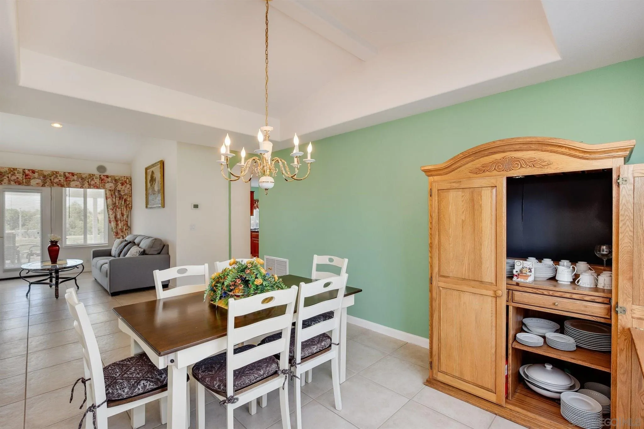 31210 Rivoli Road Valley Center, CA 92082 - Photo 9 of 62 a dining room with furniture and chandelier