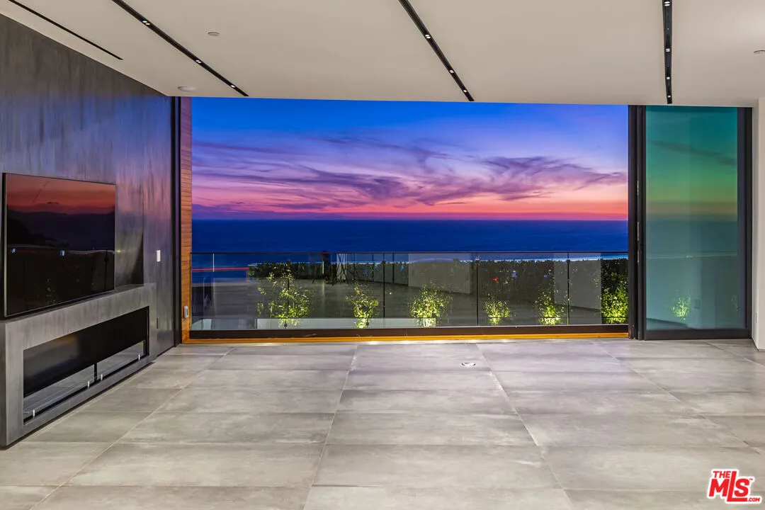 17543 Tramonto Drive Pacific Palisades, CA 90272 - Photo 1 of 1 a view of lobby with a flat screen tv