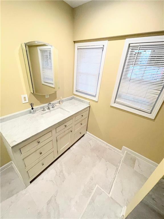 814 Moreland Avenue Southeast Atlanta, GA 30316 - Photo 11 of 15 a bathroom with a double vanity sink mirror and