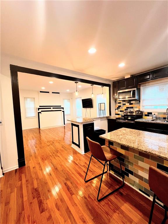 814 Moreland Avenue Southeast Atlanta, GA 30316 - Photo 4 of 15 a room with table chairs and wooden floor