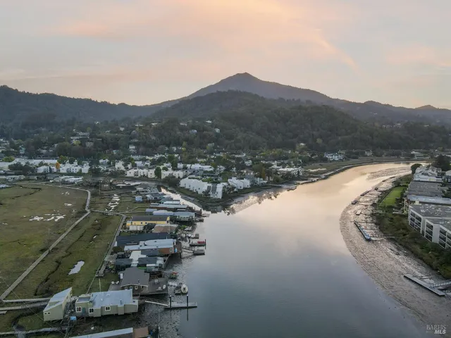 a view of a lake in middle of the town