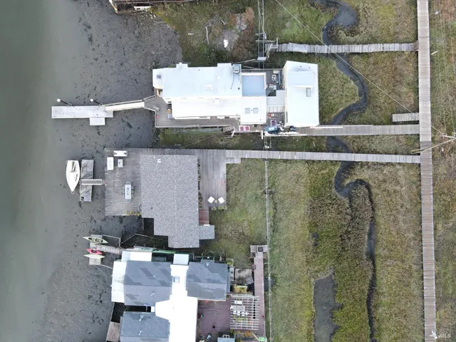 an aerial view of residential house with outdoor space