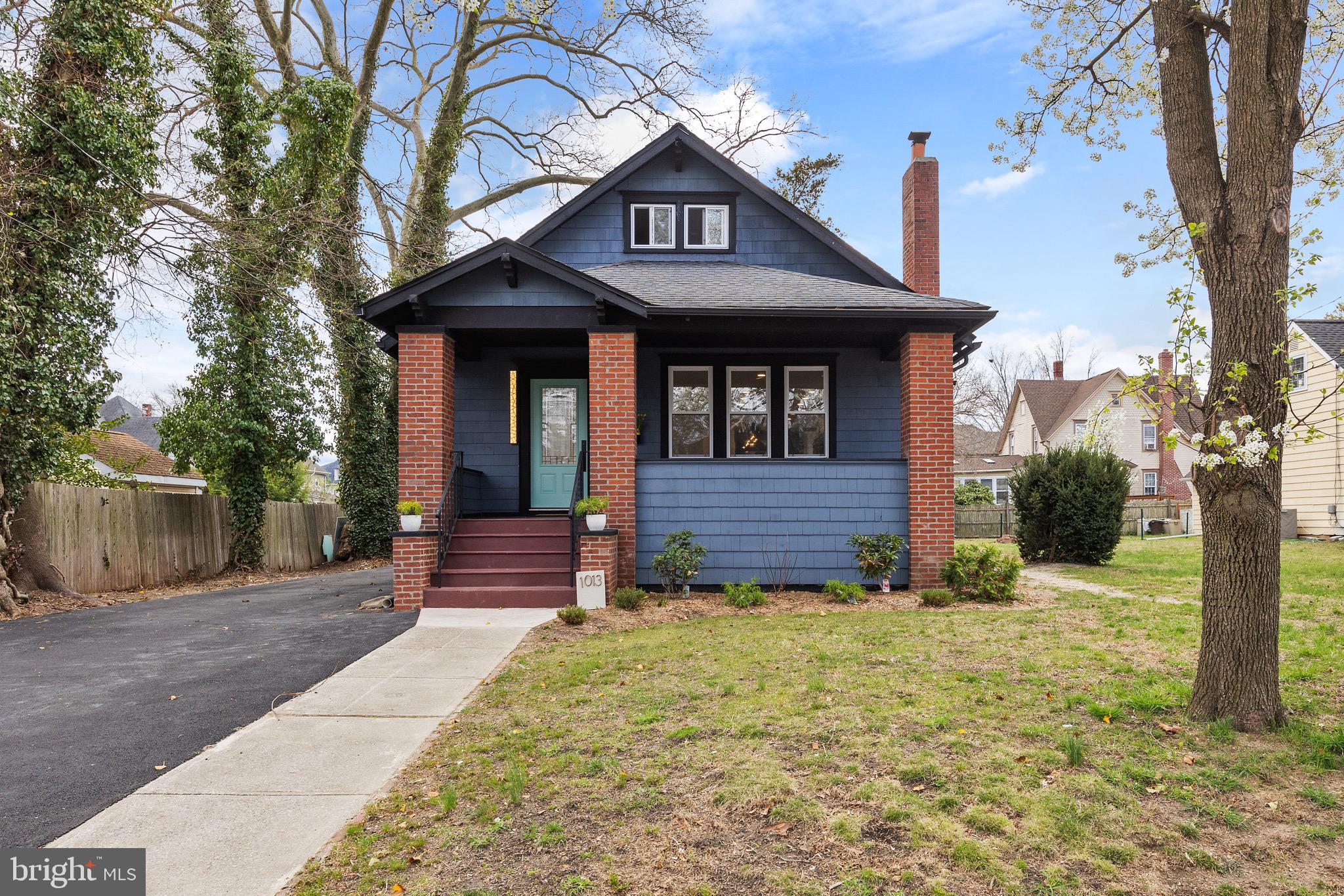 1013 Stone Road Laurel Springs, NJ 08021 - Photo 1 of 42 a front view of a house with a yard