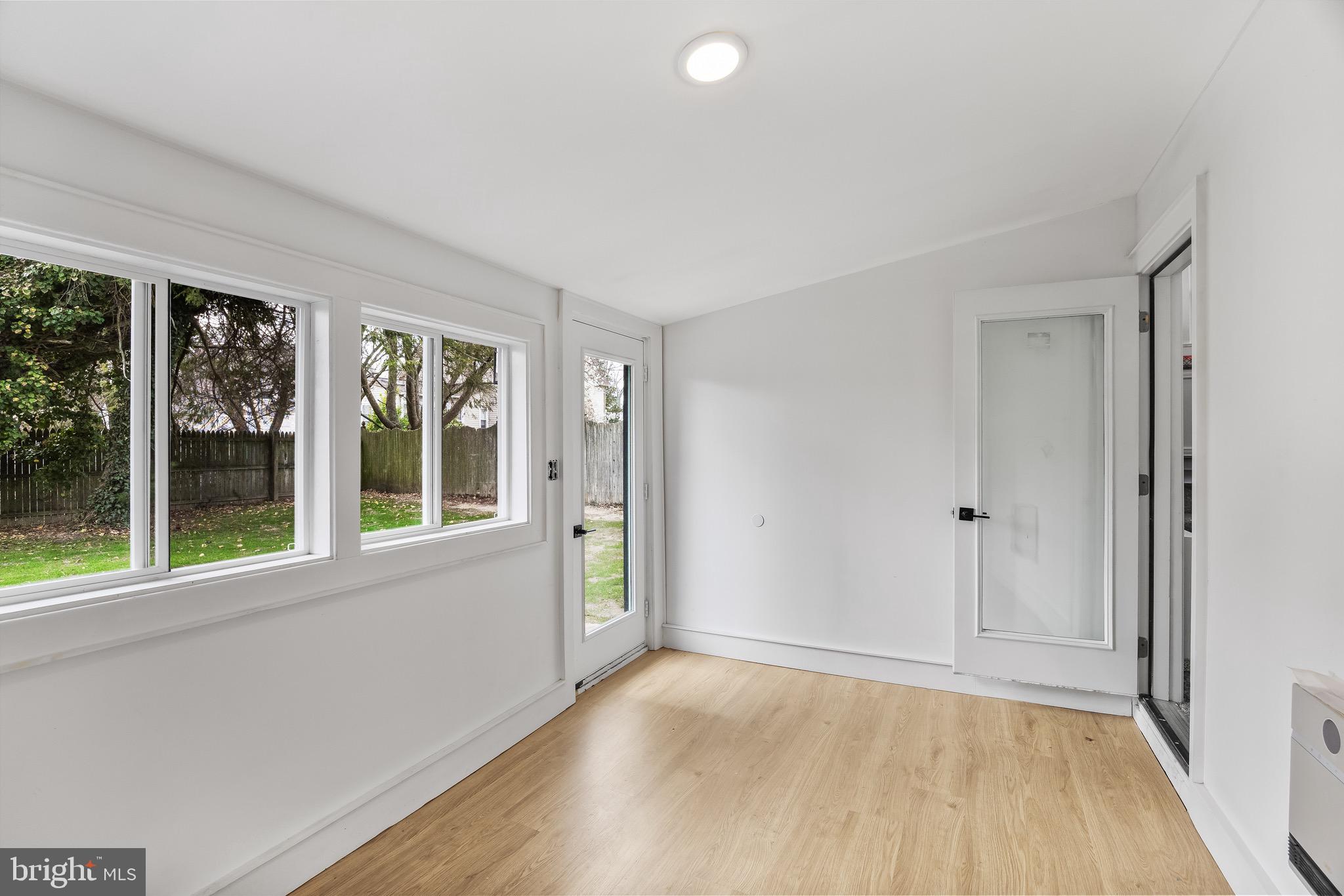1013 Stone Road Laurel Springs, NJ 08021 - Photo 17 of 42 wooden floor in an empty room with a window