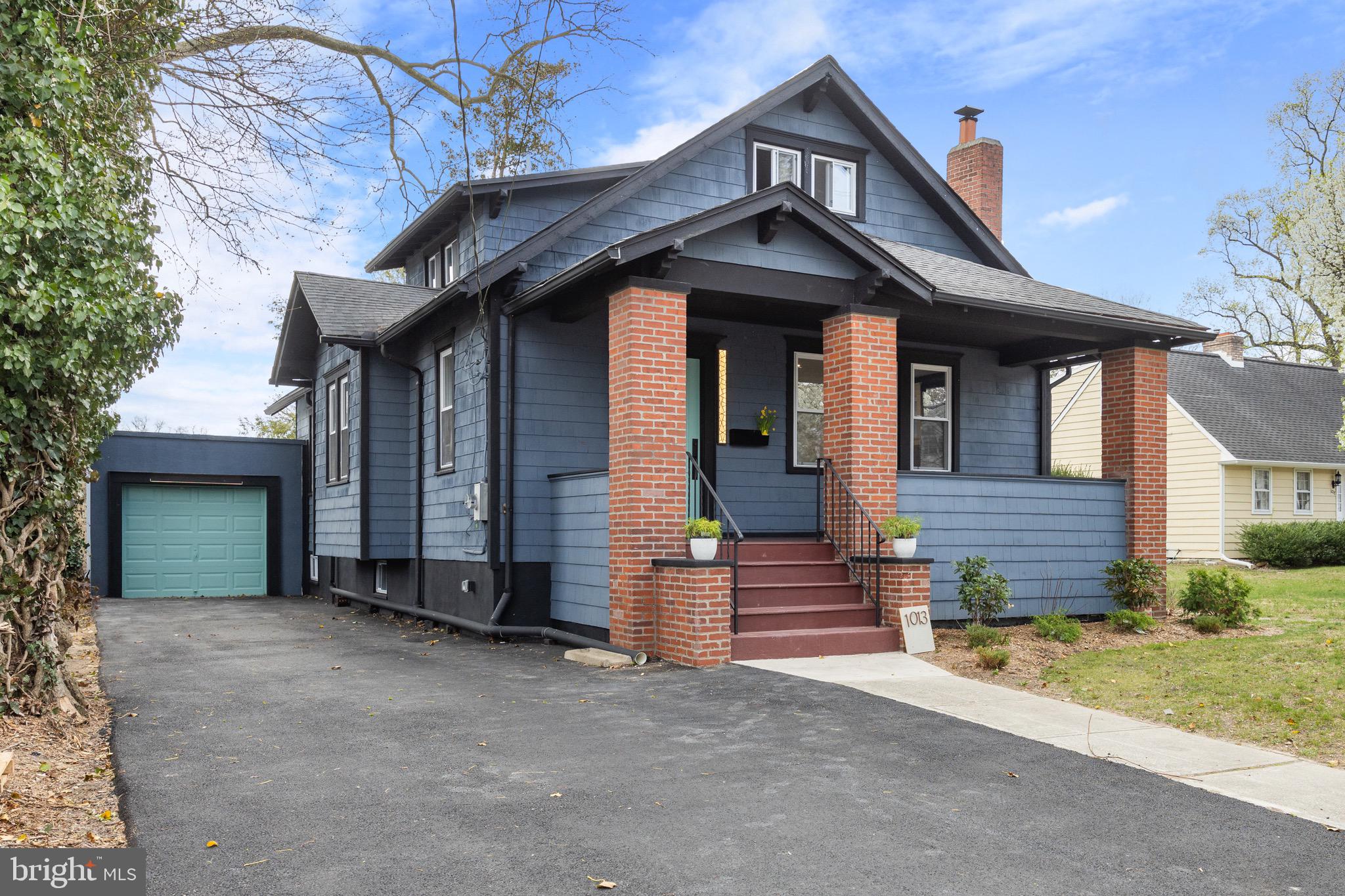 1013 Stone Road Laurel Springs, NJ 08021 - Photo 2 of 42 a front view of a house with a yard