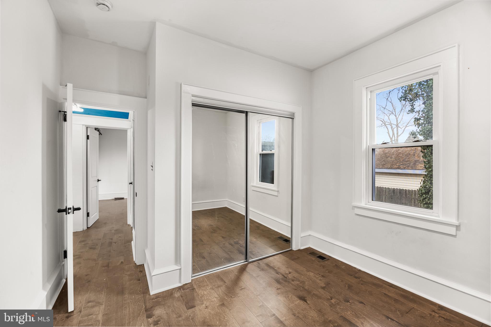 1013 Stone Road Laurel Springs, NJ 08021 - Photo 21 of 42 a view of entryway with wooden floor and door