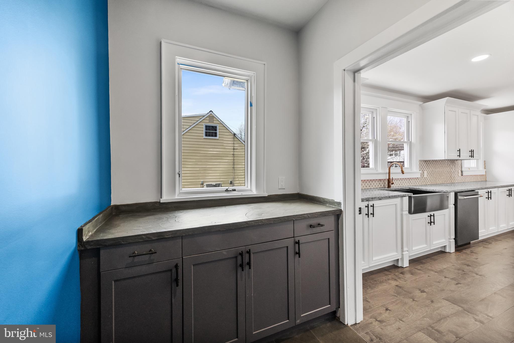 1013 Stone Road Laurel Springs, NJ 08021 - Photo 23 of 42 a kitchen with white cabinets