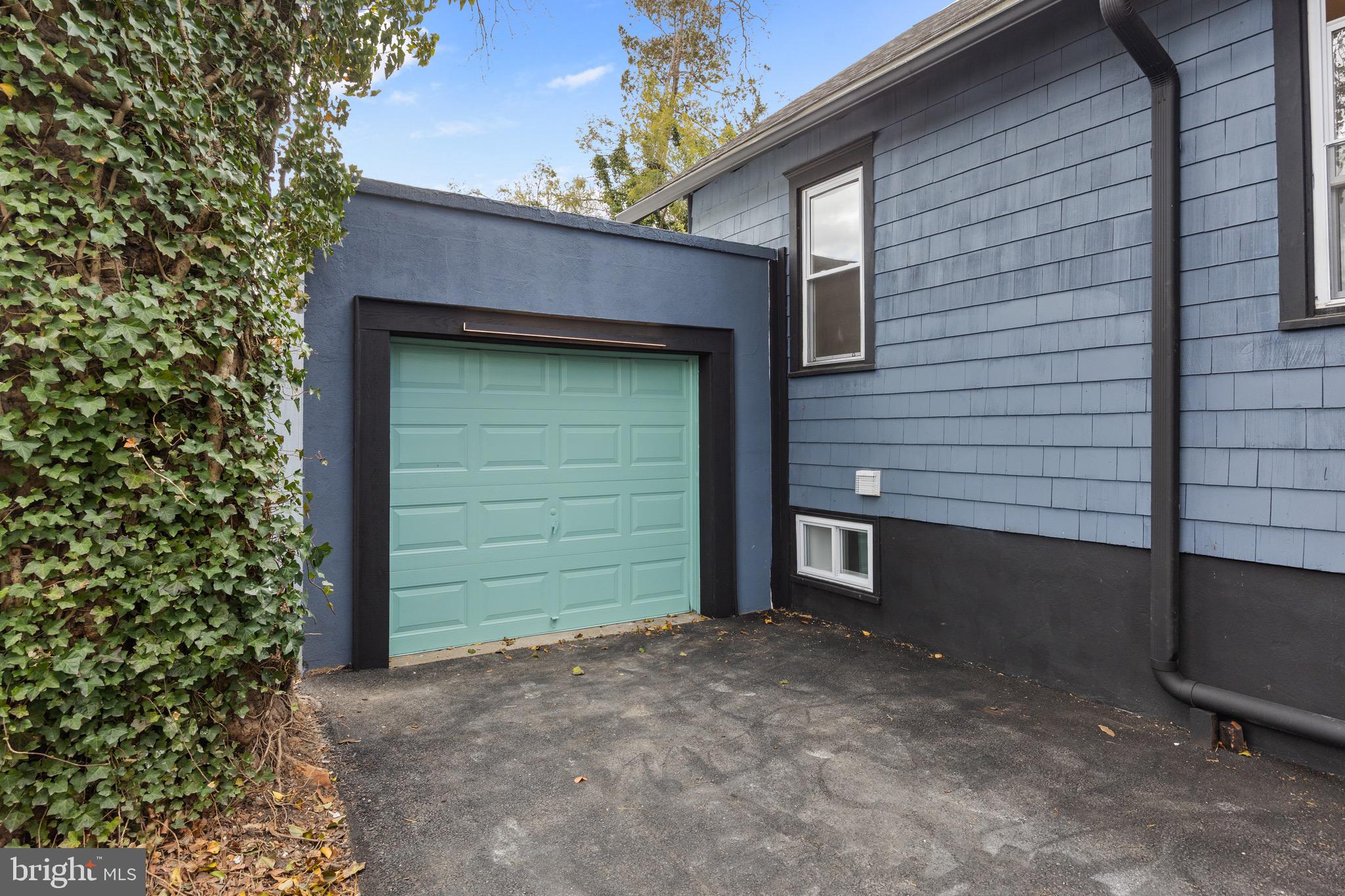1013 Stone Road Laurel Springs, NJ 08021 - Photo 3 of 42 a view of outdoor space garage and window