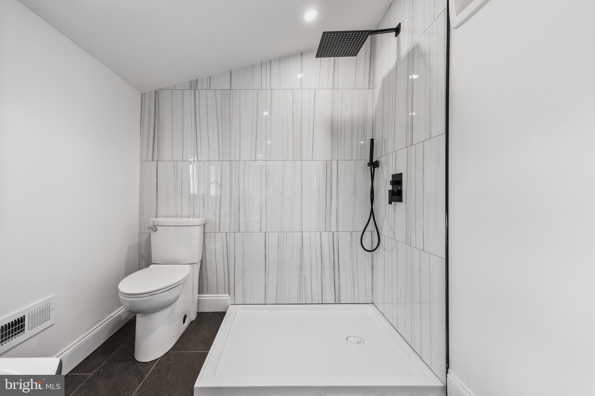 1013 Stone Road Laurel Springs, NJ 08021 - Photo 31 of 42 a bathroom with a shower and a toilet