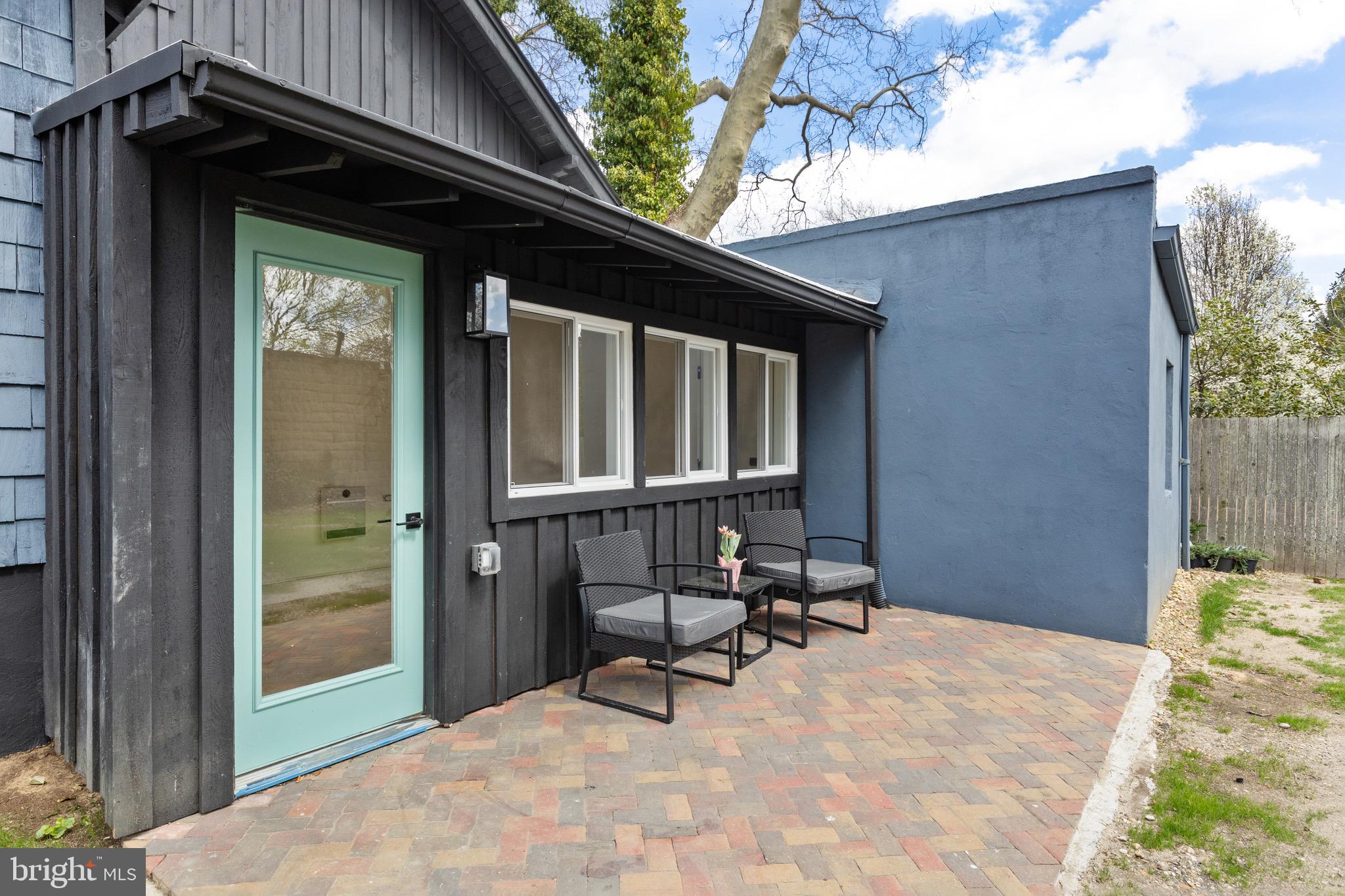 1013 Stone Road Laurel Springs, NJ 08021 - Photo 35 of 42 a view of backyard with a chair and table in the patio