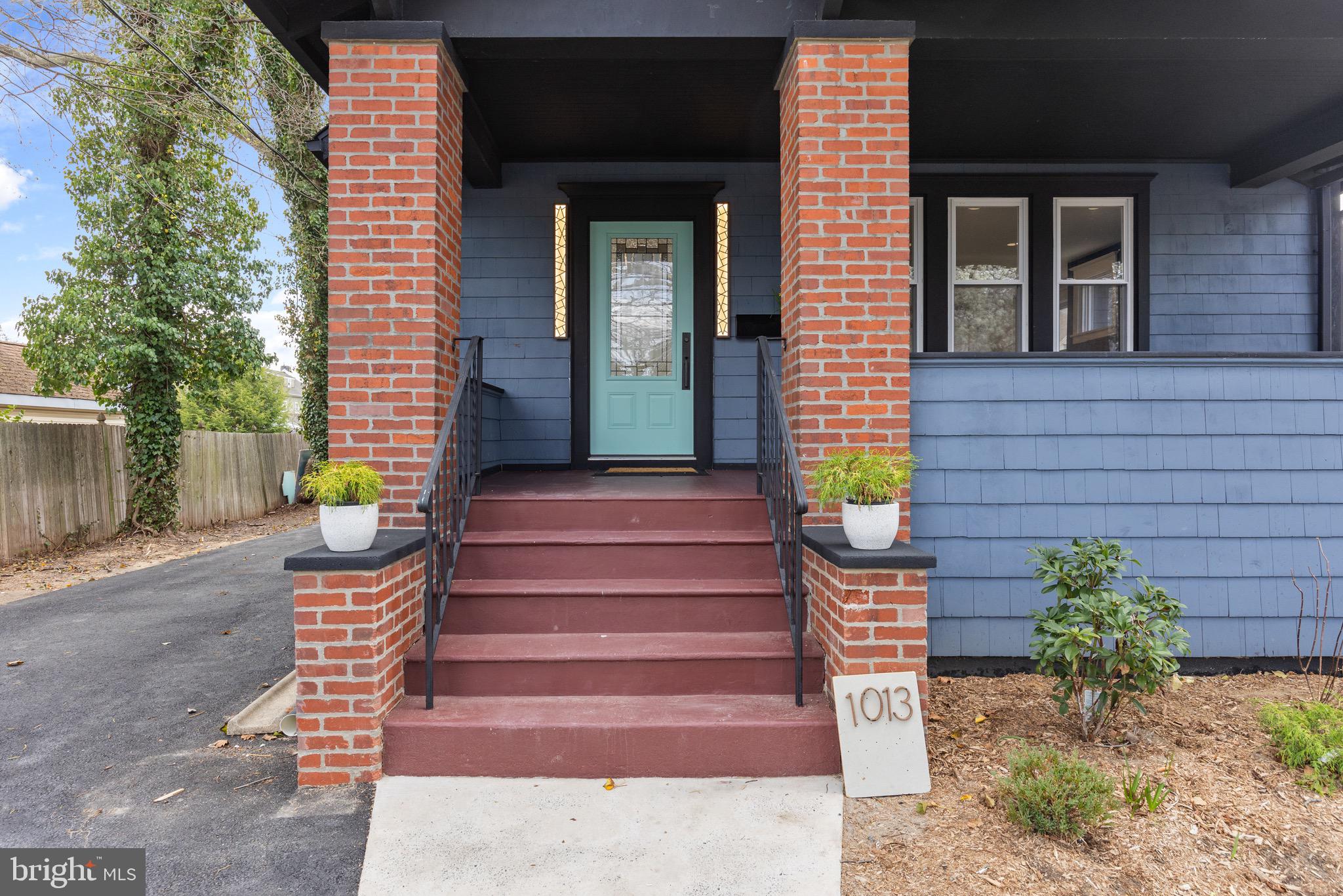 1013 Stone Road Laurel Springs, NJ 08021 - Photo 4 of 42 a front view of a house with outdoor seating