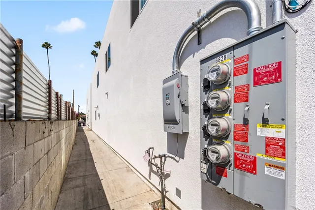 a view of backyard space with wooden fence
