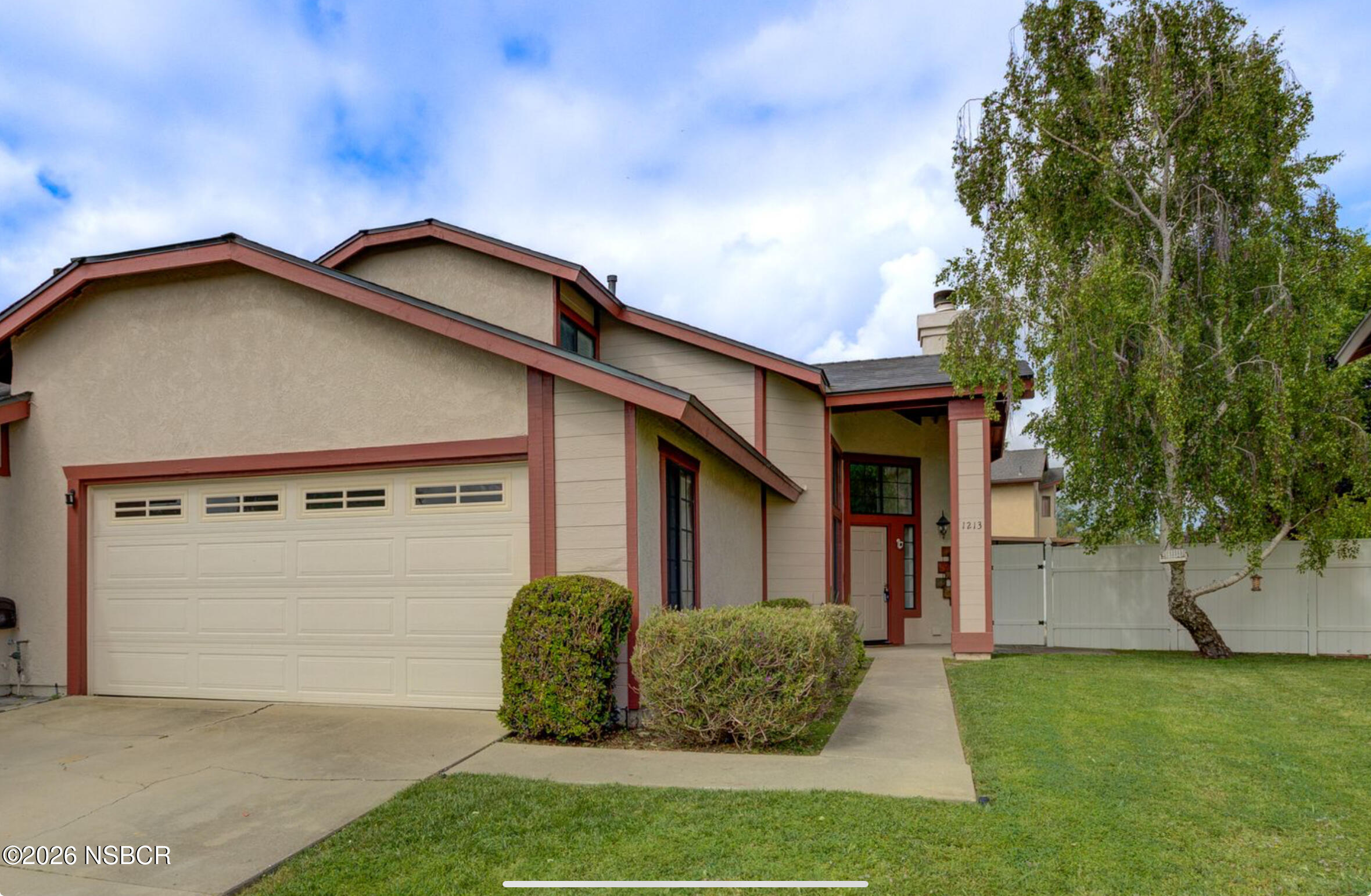 1213 Iris Court Lompoc, CA 93436 - Photo 1 of 21 a view of a house with a yard