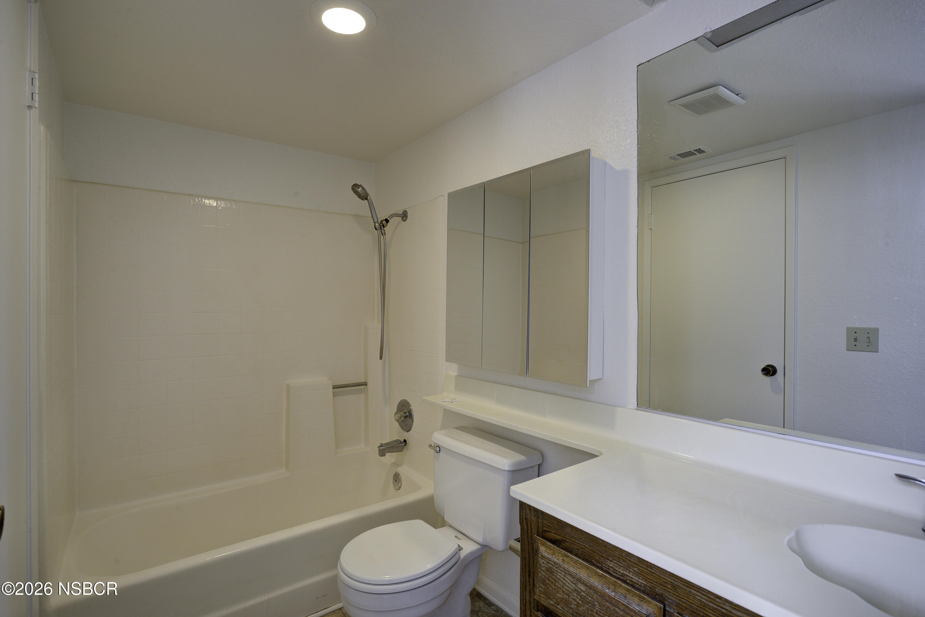 1213 Iris Court Lompoc, CA 93436 - Photo 19 of 21 a bathroom with a sink a toilet and shower