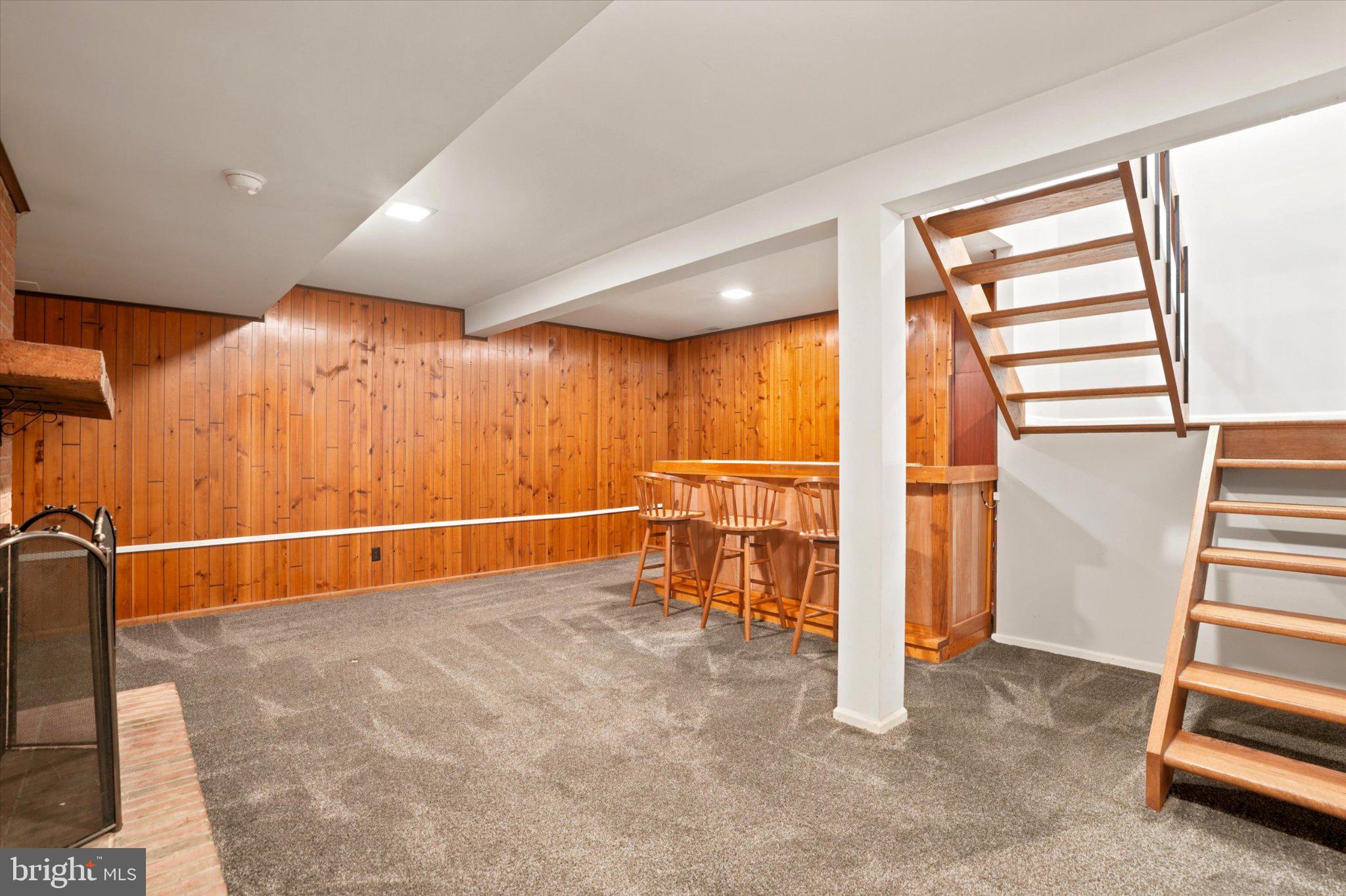18 Medinah Drive Reading, PA 19607 - Photo 20 of 25 Cozy basement retreat with wooden accents.