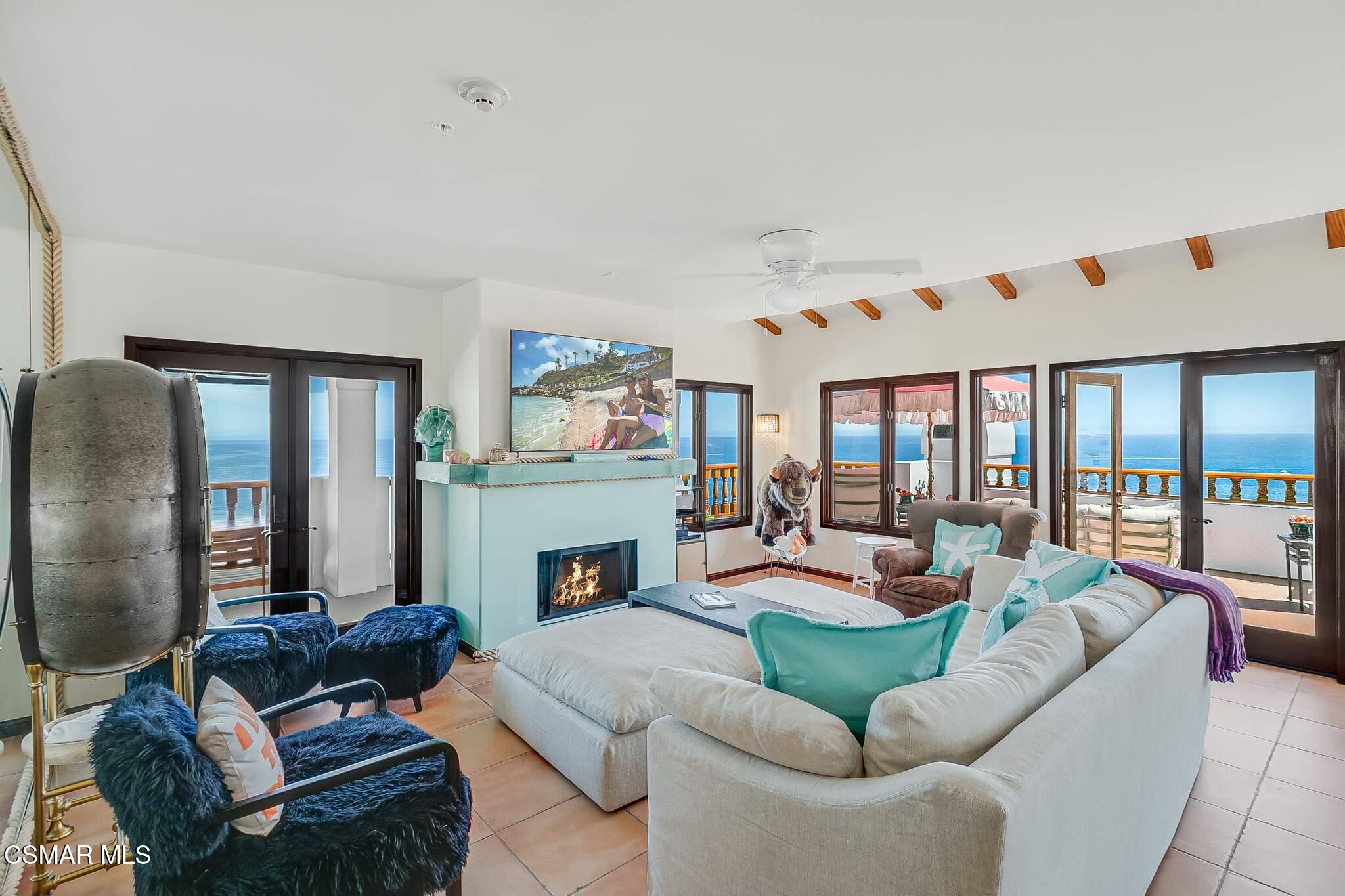 75 Gaviota Avalon, CA 90704 - Photo 11 of 49 a living room with furniture and a fireplace