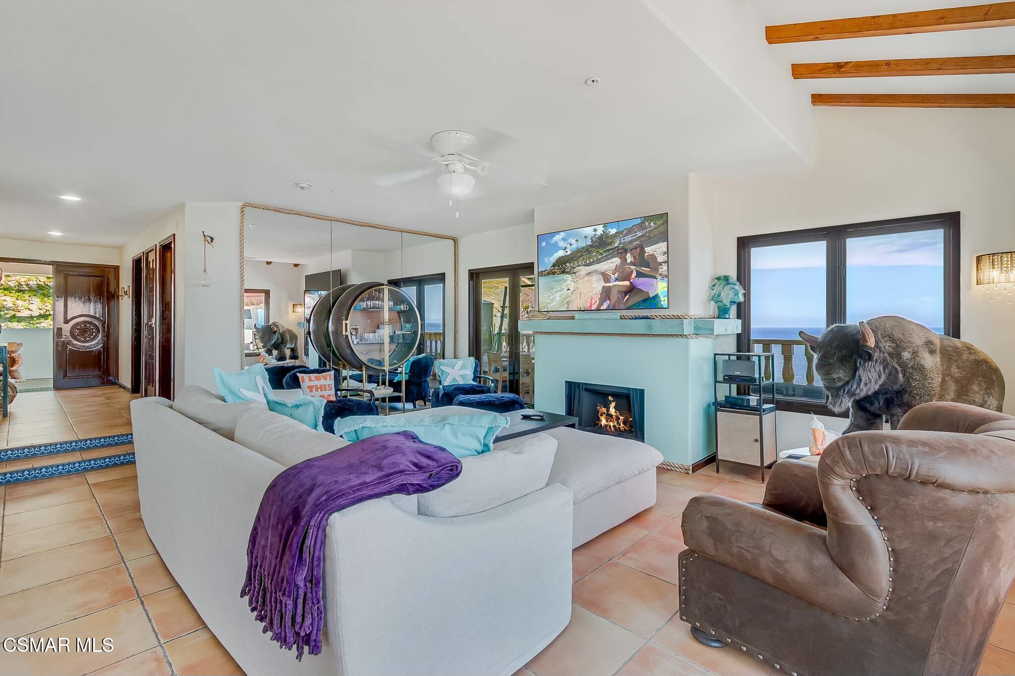 75 Gaviota Avalon, CA 90704 - Photo 15 of 49 a living room with furniture and a fireplace