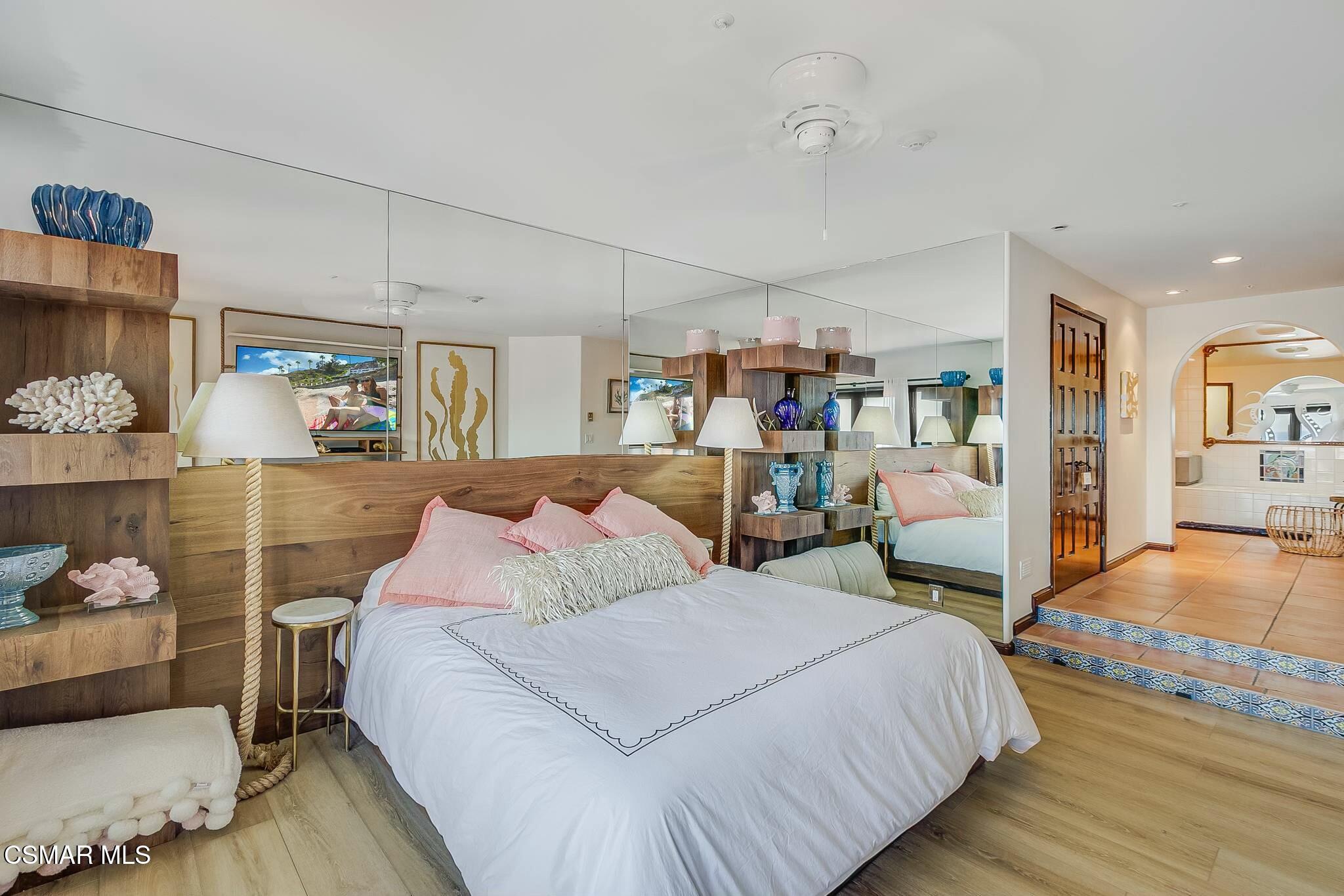 75 Gaviota Avalon, CA 90704 - Photo 23 of 49 a spacious bedroom with a bed and lots of wooden floor