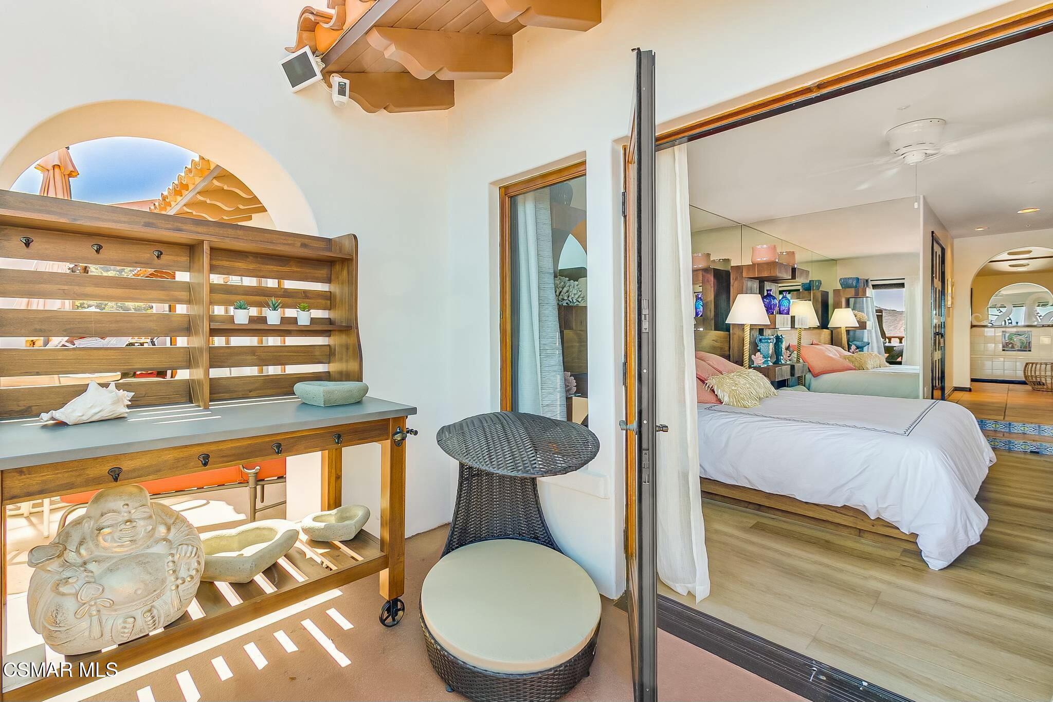 75 Gaviota Avalon, CA 90704 - Photo 24 of 49 a bedroom with a bed and window