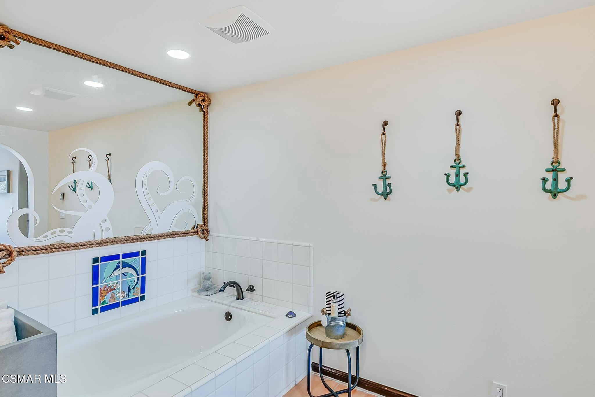 75 Gaviota Avalon, CA 90704 - Photo 28 of 49 a bathroom with a bathtub and a shower