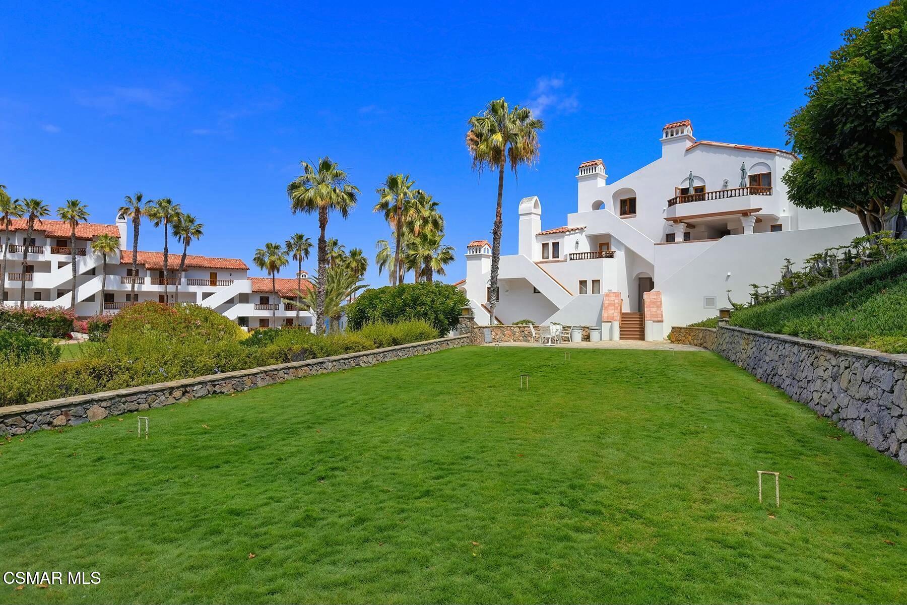 75 Gaviota Avalon, CA 90704 - Photo 45 of 49 a view of a house with a yard and potted plants
