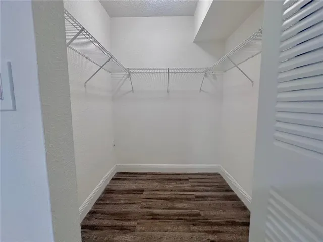 a view of a room with racks on the wall