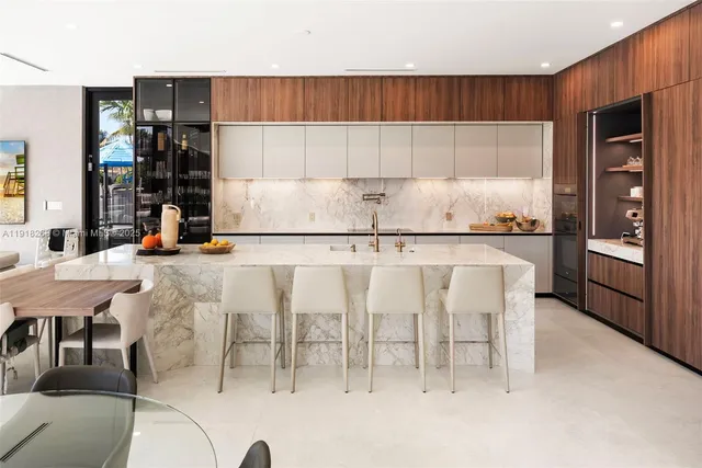 a view of a couches with wooden floor