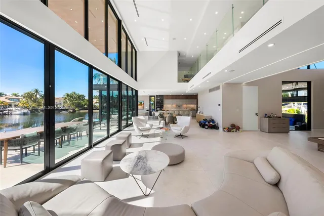 a bathroom with a double vanity sink mirror and shower