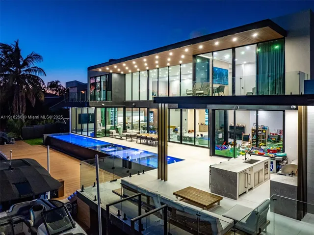 a view of a house with a yard and a fireplace