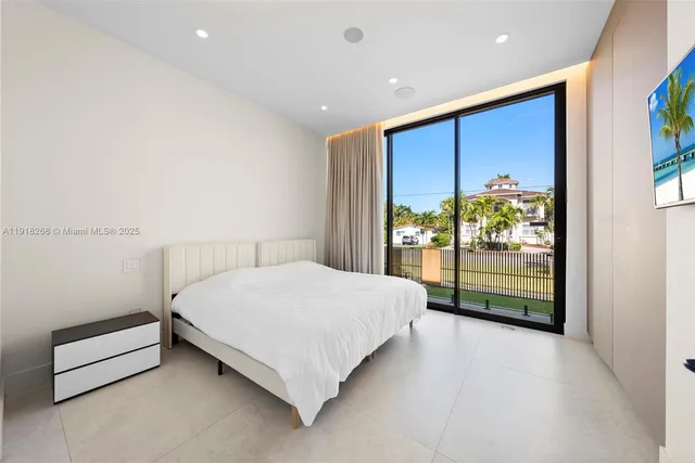 a view of swimming pool with chairs in patio
