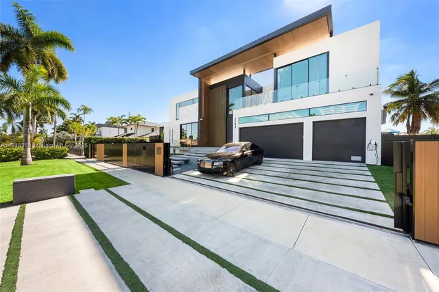 a kitchen with a sink and white cabinets