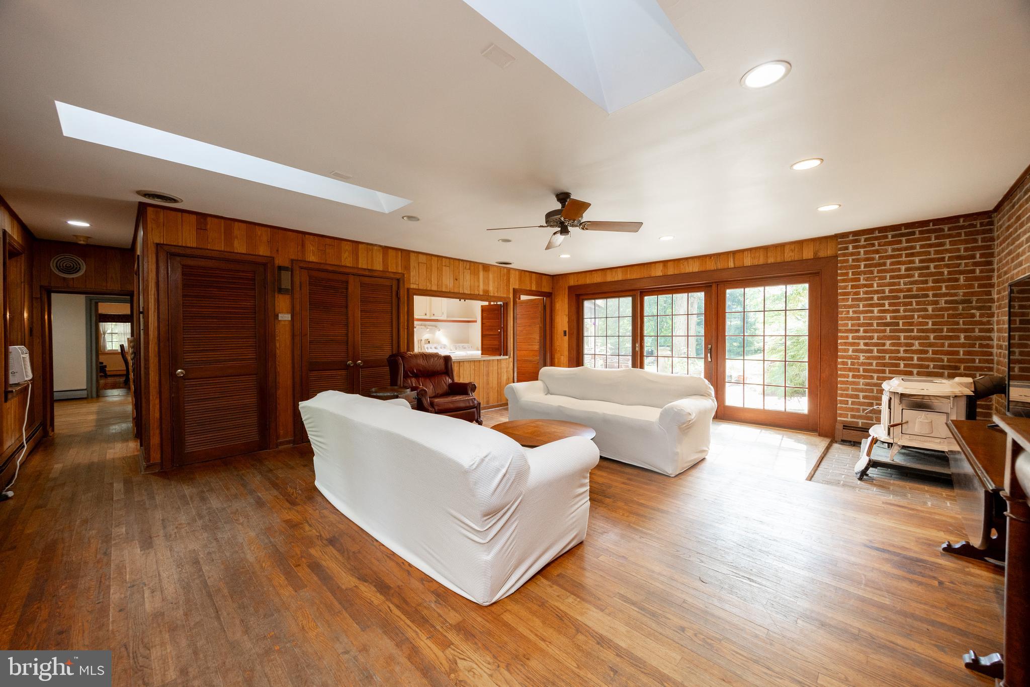 1699 Warpath Road West Chester, PA 19382 - Photo 22 of 65 a living room with furniture and a large window