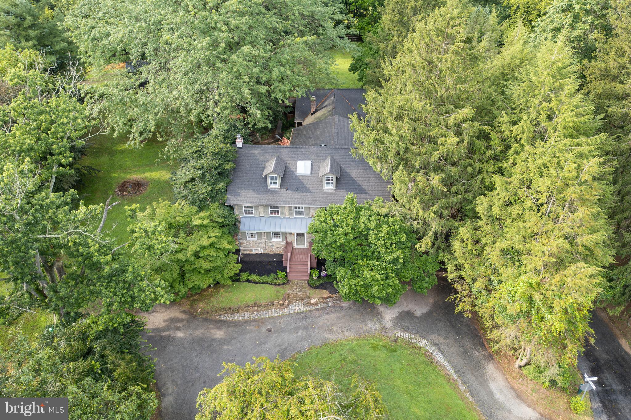 1699 Warpath Road West Chester, PA 19382 - Photo 3 of 65 an aerial view of a house with a yard