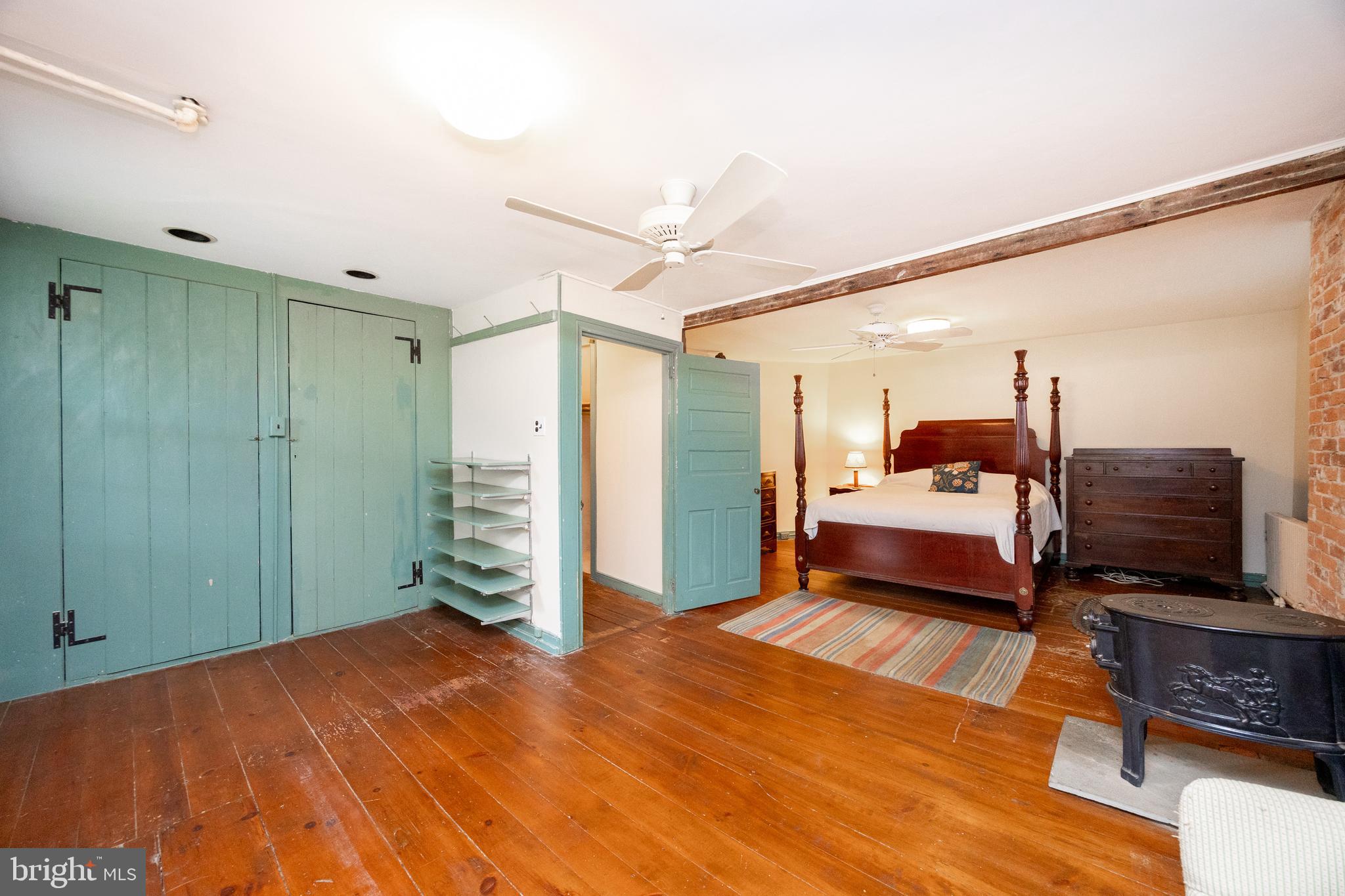 1699 Warpath Road West Chester, PA 19382 - Photo 31 of 65 a bedroom with a bed and a flat screen tv