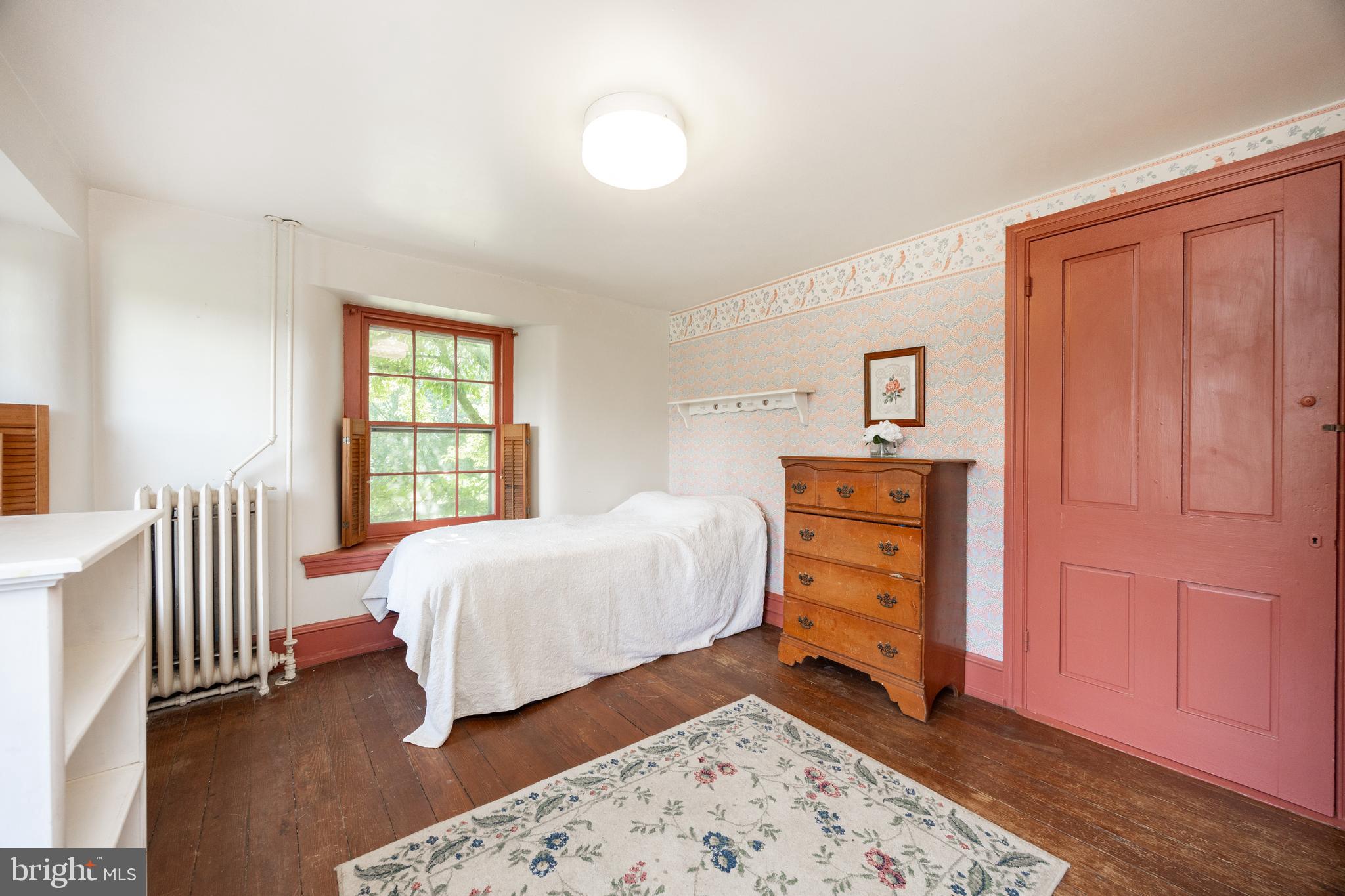 1699 Warpath Road West Chester, PA 19382 - Photo 33 of 65 a bedroom with a bed and a window