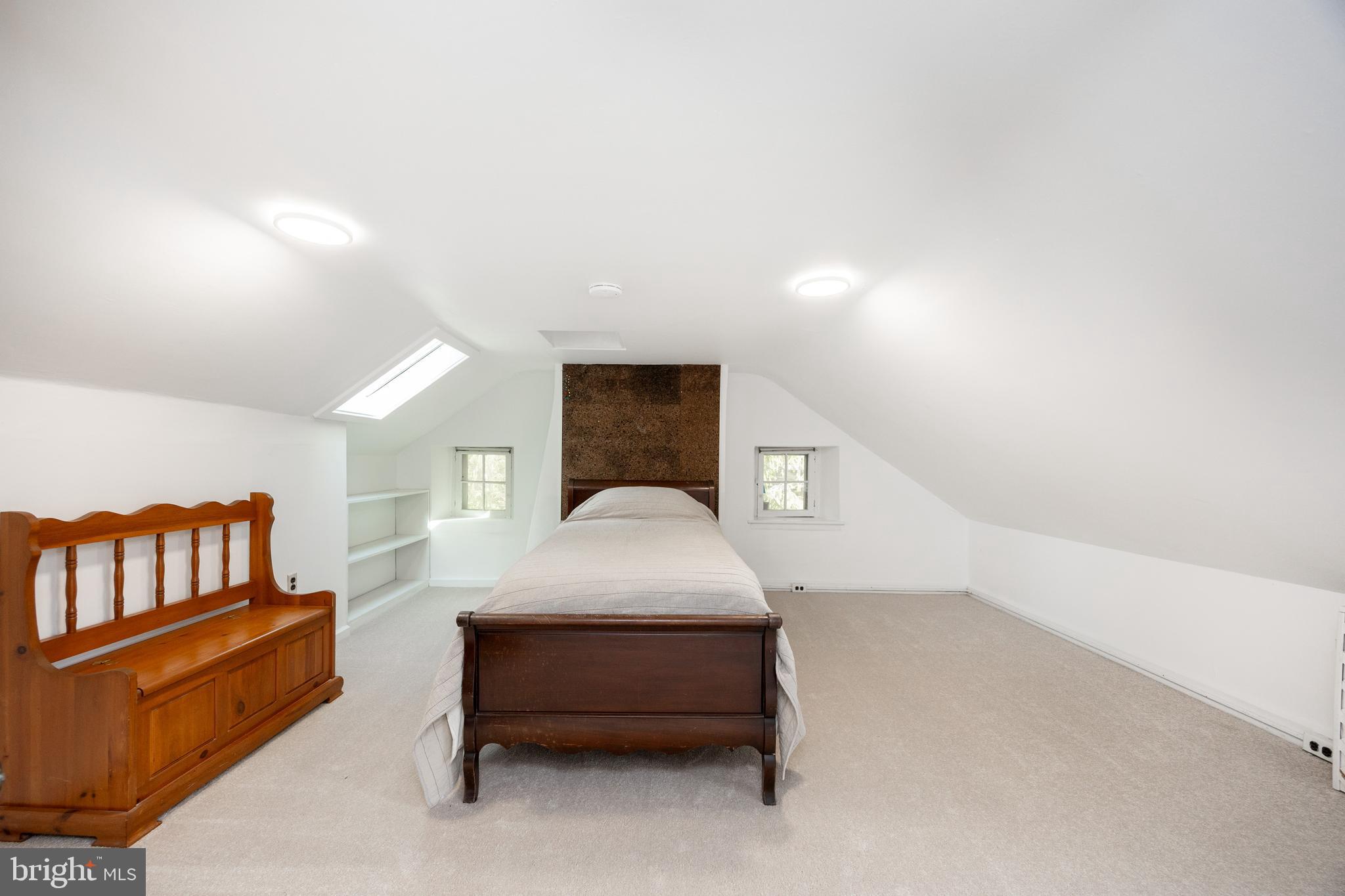 1699 Warpath Road West Chester, PA 19382 - Photo 39 of 65 a bedroom with a bed and a couch